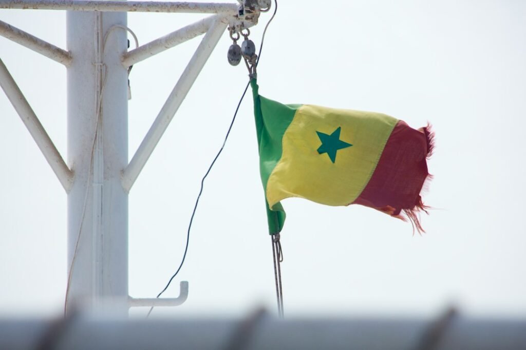 Burkina Faso flag representing diplomatic relations with France